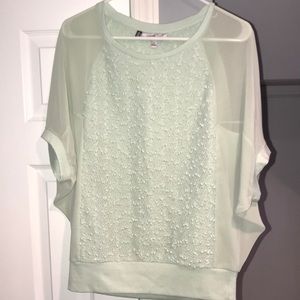 Dressy Jennifer Lopez batwing sleeve shirt.